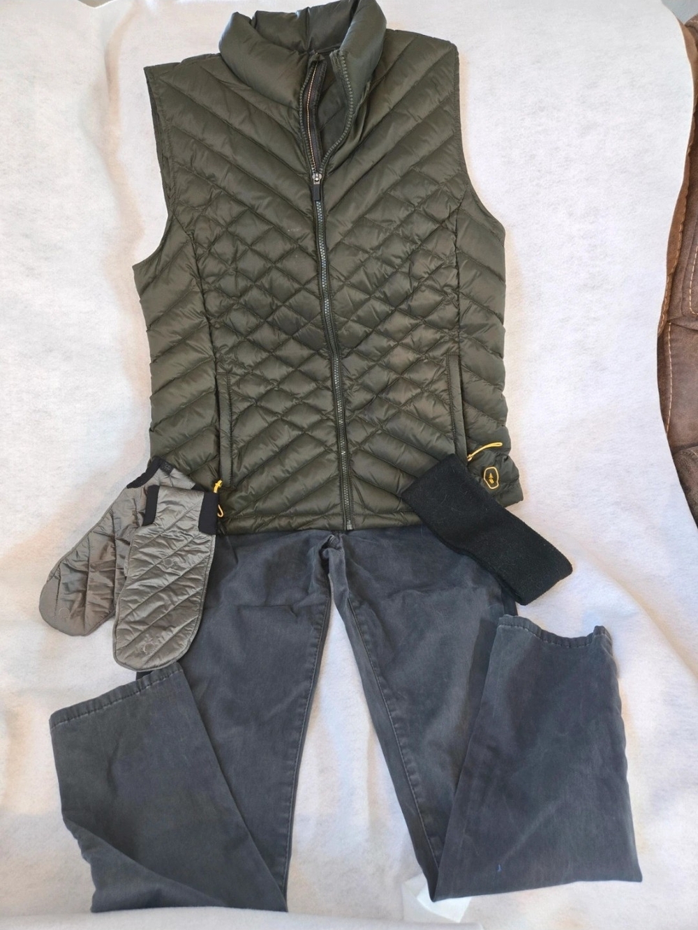 Bass Olive Quilted Puffer Vest with Black Accessories And Grey Jeggins
